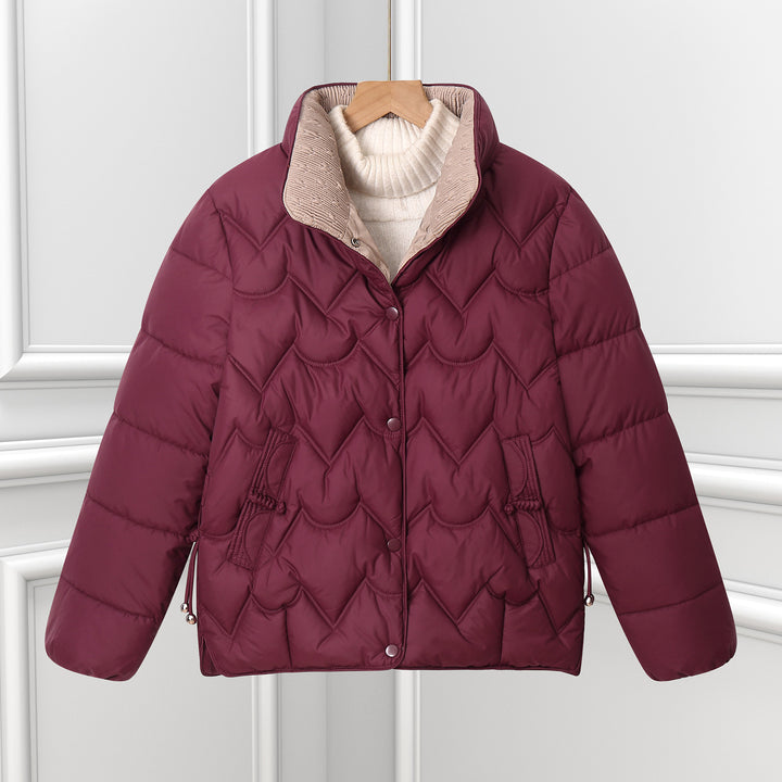 Damen nan kurze gesteppte Pufferjacke mit dekorativer Bogensteppung und Druckknopfblende Drune