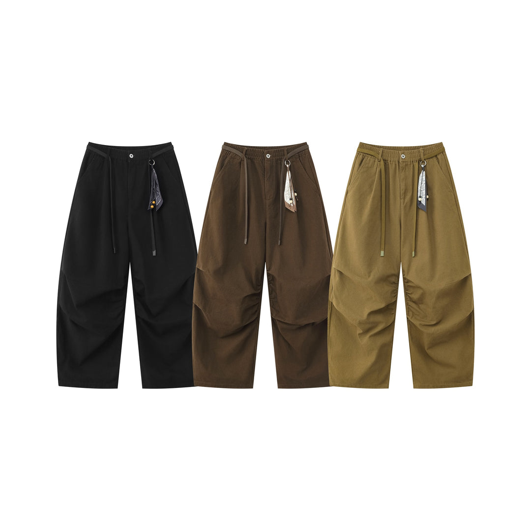 Damen Weite Culotte‑Hose mit Elastikbund, Stufenfalten und dekorativem Tuchanhänger Drune