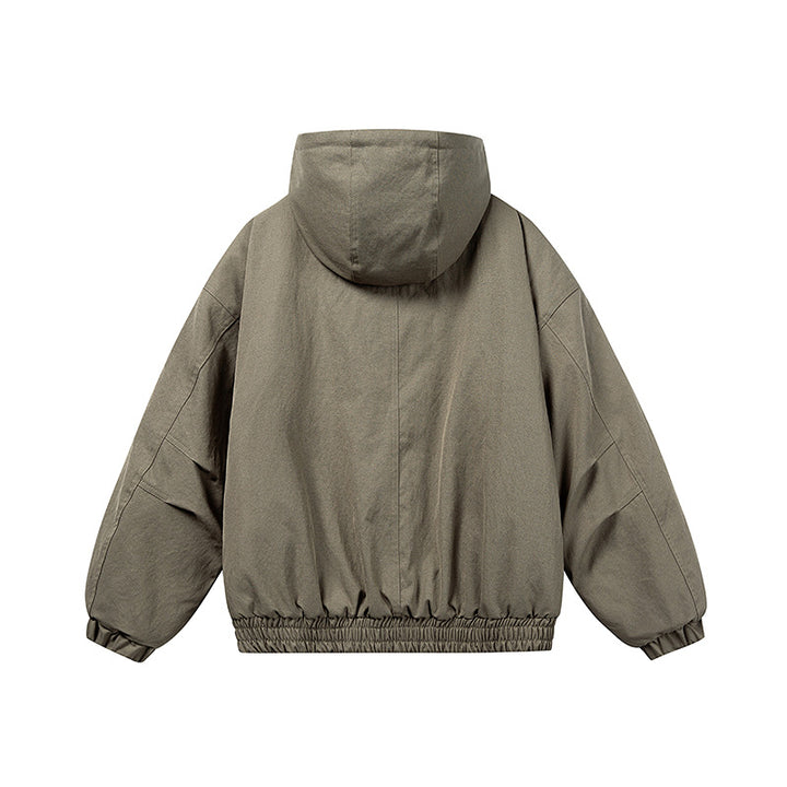 Unisex Kurz geschnittene Isolationsjacke im Boxy‑Cut mit Teddyinnenfutter und diagonal eingesetzten Reißverschlusstaschen Drune