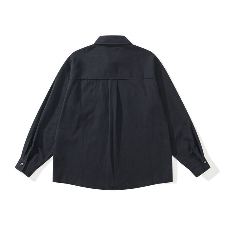 Unisex Boxy-Overshirtjacke im Utility‑Stil mit aufgesetzten Klappentaschen und Hemdkragen Drune