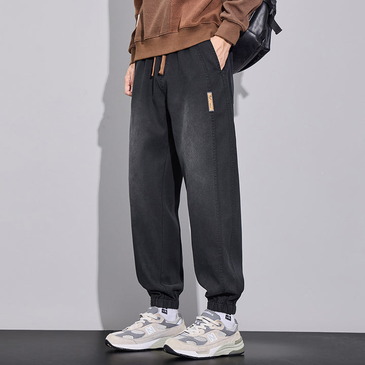 Herren Relaxed-Fit Jogginghose im Denim‑Look mit elastischem Bund, Tunnelzug und geripptem Beinabschluss Drune