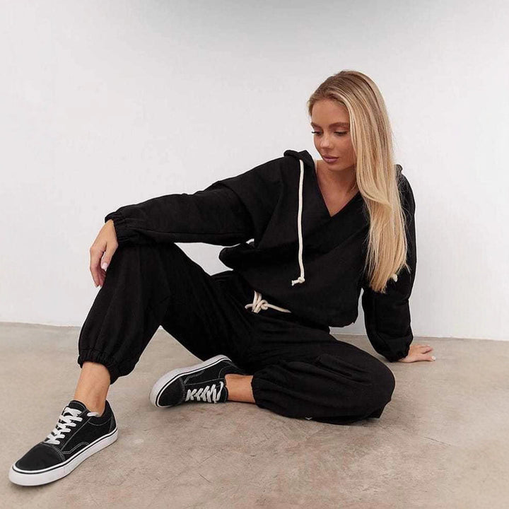 Damen lässiger Jumpsuit mit tiefem V-Ausschnitt und praktischen Taschen Drune