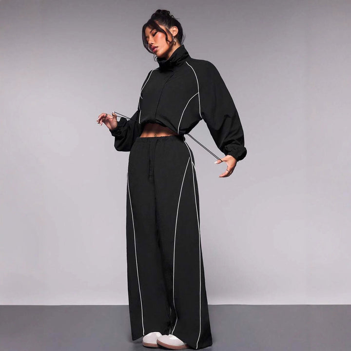Damen sportives Cropped Windbreaker-Set mit Stehkragen Tunnelzug und reflektierenden Paspeln Drune