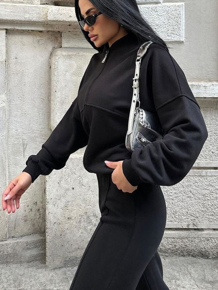 Damen sportive Oversize-Fleecejacke mit diagonaler Reißverschluss-Optik und weit geschnittener High-Waist-Jogginghose Drune