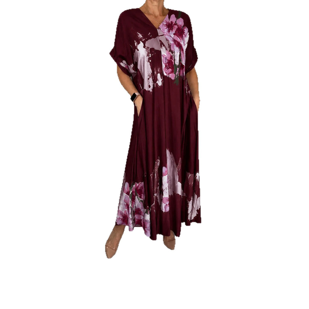 Damen Maxikleid mit weitem Fall, V-Ausschnitt, Eingrifftaschen und floraler Aquarelloptik Drune