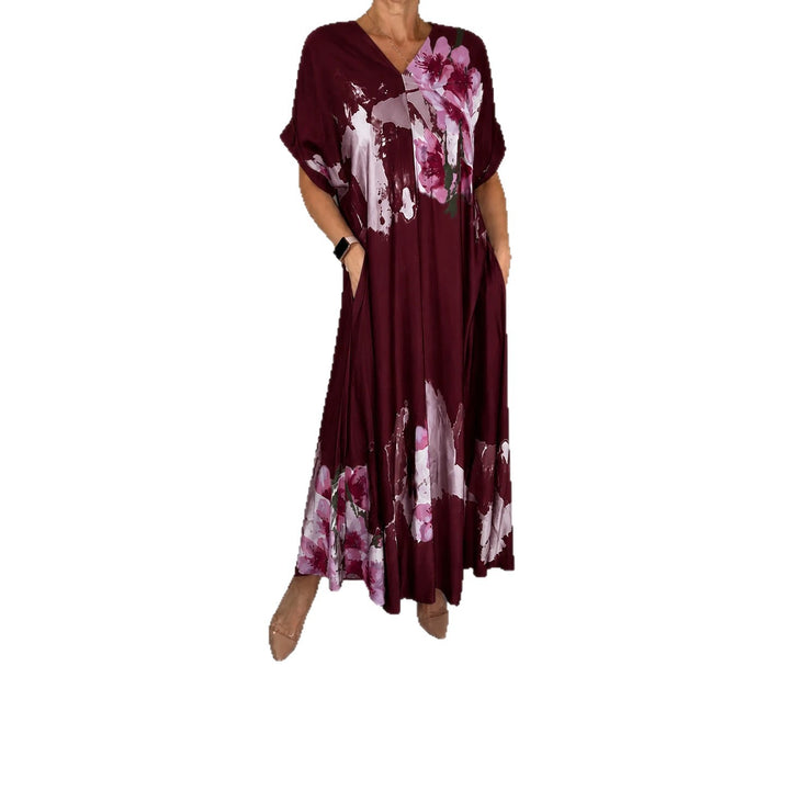 Damen Maxikleid mit weitem Fall, V-Ausschnitt, Eingrifftaschen und floraler Aquarelloptik Drune
