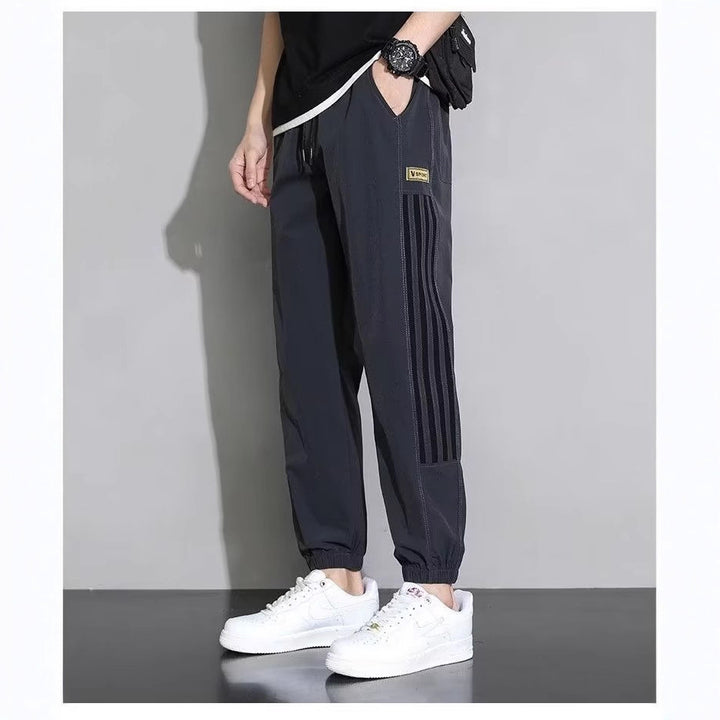 Damen Sportliche Trainingshose mit seitlichen Streifen Drune