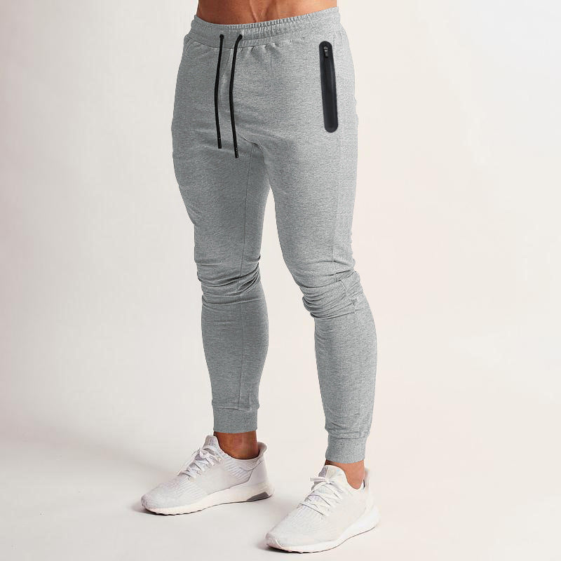 Herren schmal geschnittene Jogginghose mit Reißverschlusstaschen und Kordelzug Drune