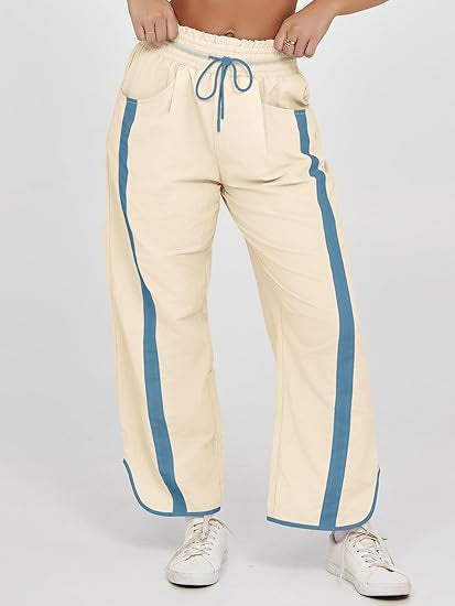 Damen nan relaxte Trackpants mit seitlichem Kontraststreifen, elastischem Smokbund und Eingrifftaschen Drune