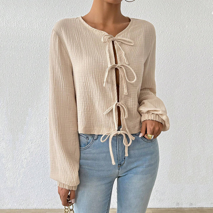 Damen kurz geschnittene Musselinbluse mit Knotenverschlüssen und Ballonärmeln Drune
