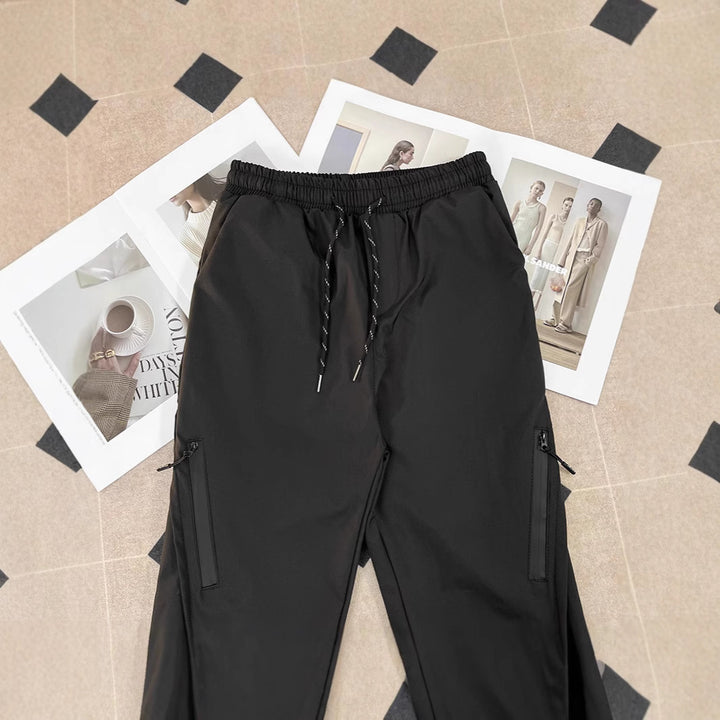 Unisex Sportliche Jogginghose mit verstellbarem Bund und Seitentaschen Drune