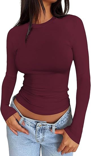 Damen Körpernahes Langarmshirt im Cropped-Look mit verlängerten Ärmeln und Daumenloch Drune