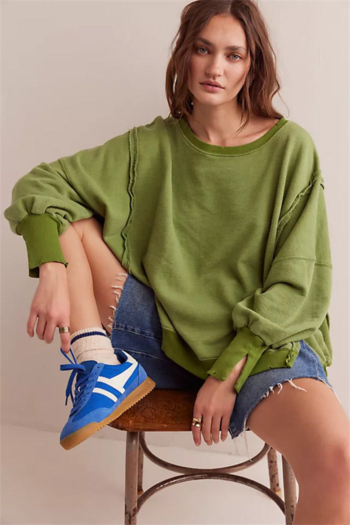 Damen oversized Sweatshirt mit Ballonärmeln, offenen Saumnähten und seitlichen Schlitzen Drune