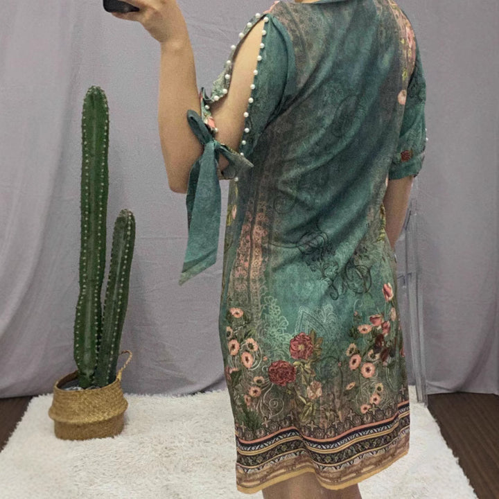 Damen Romantisches Minikleid mit transparenten Ärmeln und verspieltem Blumenmuster Drune