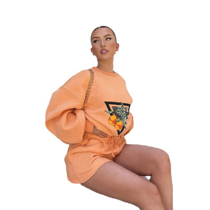 Damen sportlicher Sweatshirt- und Shorts-Anzug mit urbanem Obstmotiv und lässigem Schnitt