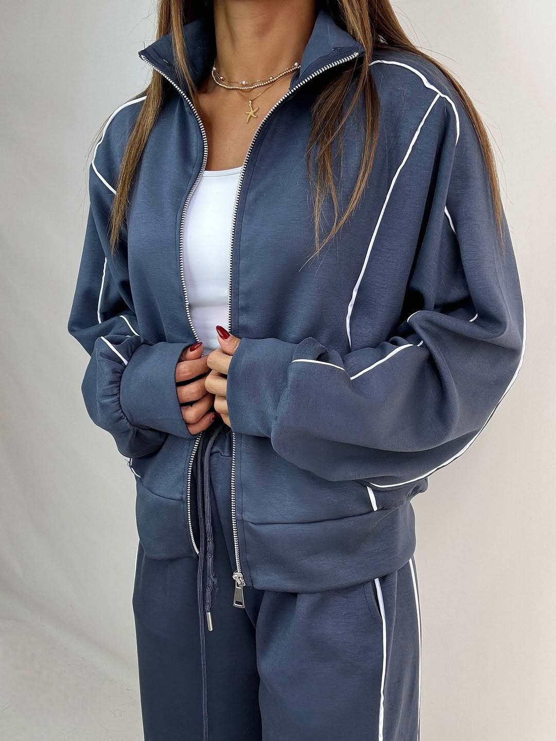 Damen sportliches Trainingsset mit stylischem Reißverschluss und modernem Streifenmuster Drune