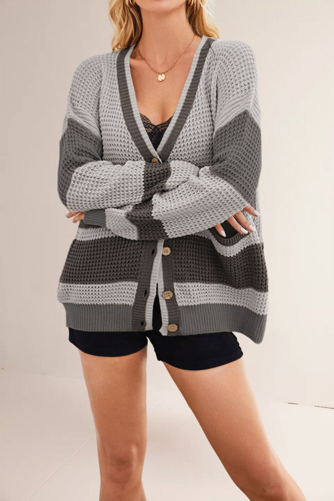 Damen lässige Strickjacke mit tiefem V-Ausschnitt und Taschen Drune