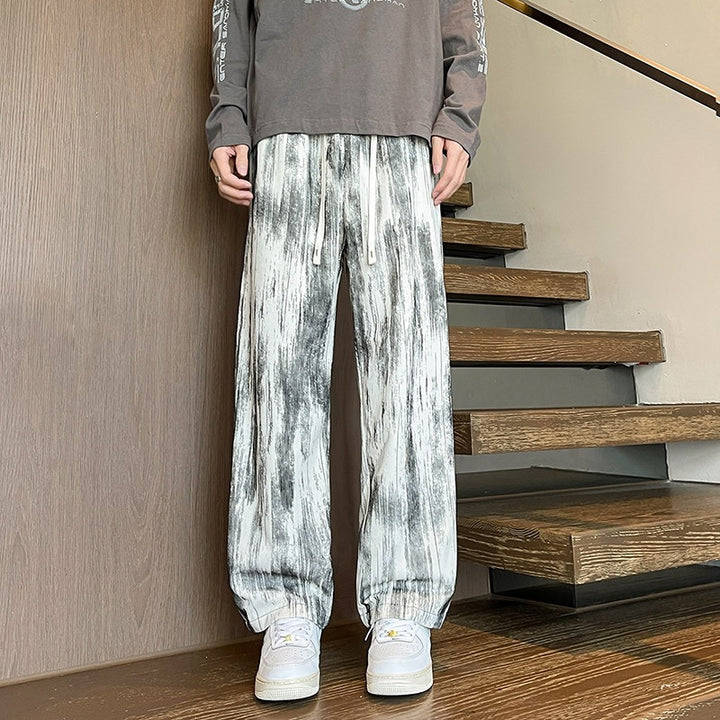 Herren Weit geschnittene Loungehose mit Marmorprint aus strukturiertem Jersey Drune