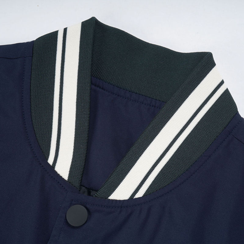 Herren College-Bomberjacke im Varsity-Stil mit Kontrastärmeln, Druckknopf‑Front und gerippten Bündchen Drune
