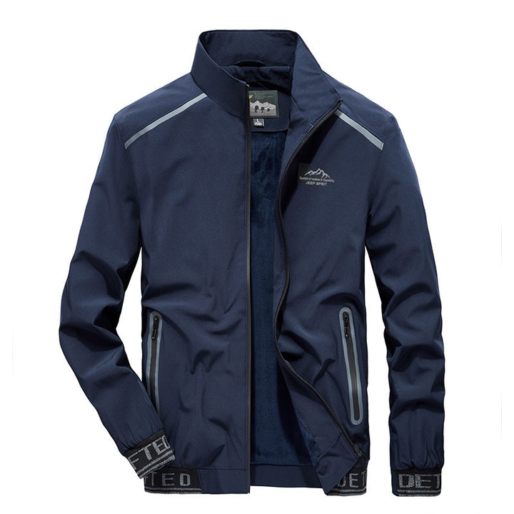 Herren Performance-Softshelljacke mit wärmender Fleecefutter, wind- und wasserabweisender Membran und reflektierenden Akzenten Drune