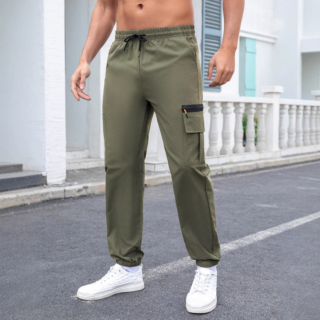 Herren Tech-Cargo-Jogginghose mit elastischem Tunnelzug, Reißverschluss‑Beintasche & eng anliegendem Fußbündchen Drune