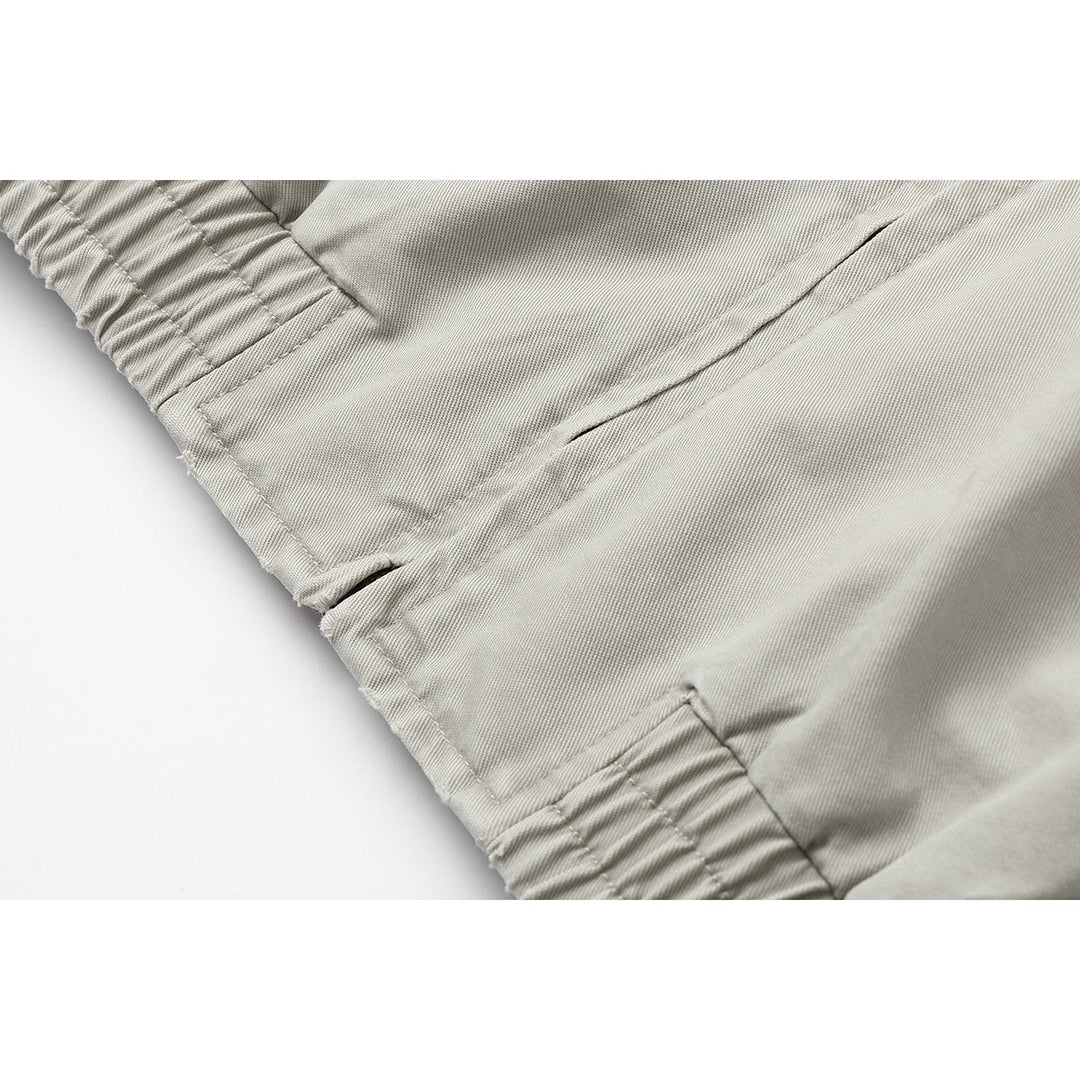 Herren Kurzblouson im Boxy‑Cut aus Canvas mit diagonalen Reißverschlusstaschen und elastischem Saum Drune