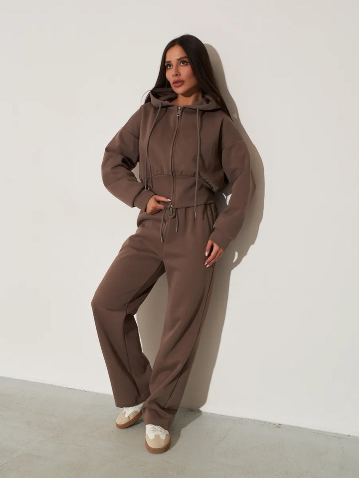 Damen kurzes Kapuzen-Zipshirt mit tailliertem Tunnelzug und weit geschnittene High-Waist-Loungehose Drune
