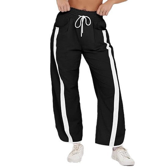 Damen nan relaxte Trackpants mit seitlichem Kontraststreifen, elastischem Smokbund und Eingrifftaschen Drune