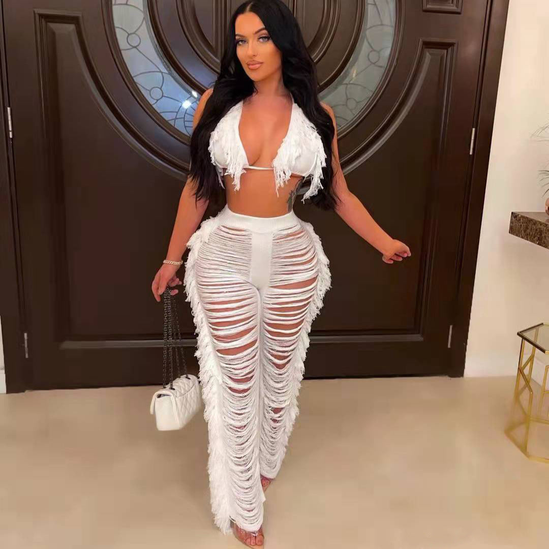 Damen Strandoutfit mit fransigem Crop-Top und lässiger Hose Drune