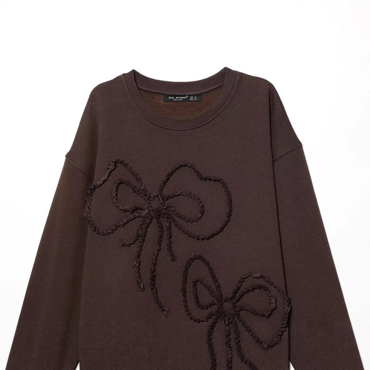 Damen weiter Sweatshirt mit dreidimensionaler Schleifen-Applikation und Rippbündchen Drune