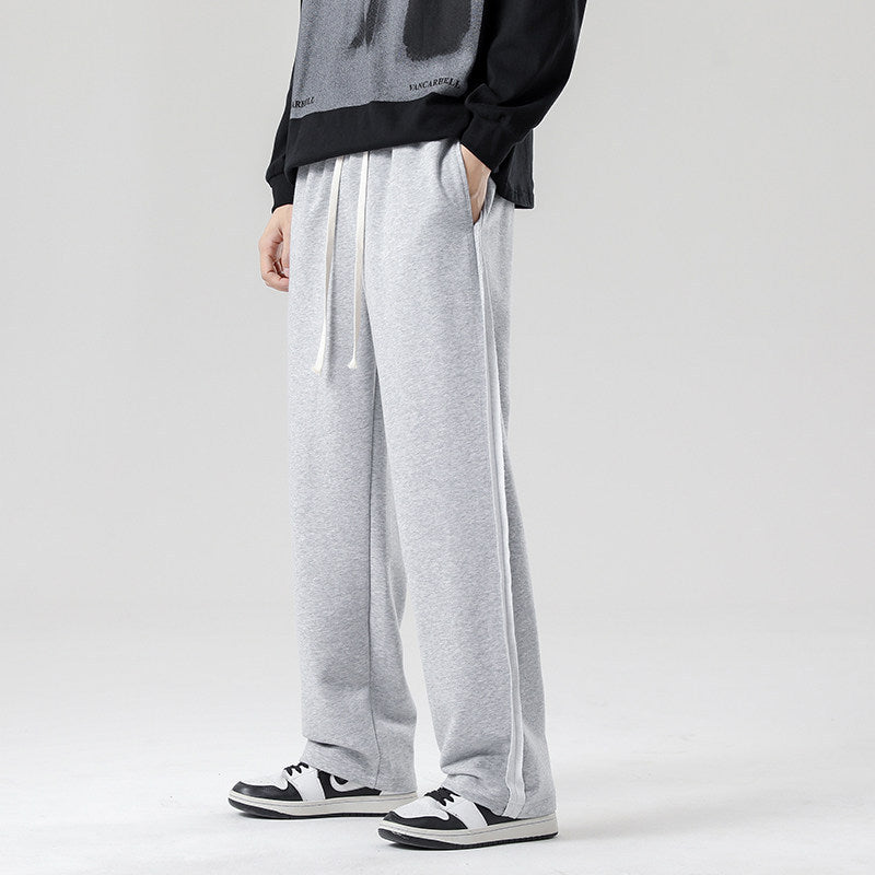 Herren weite Jogginghose im Oversize-Schnitt mit Seitenstreifen, Kordelzug & Fleecefutter Drune