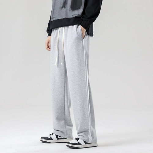 Herren weite Jogginghose im Oversize-Schnitt mit Seitenstreifen, Kordelzug & Fleecefutter Drune
