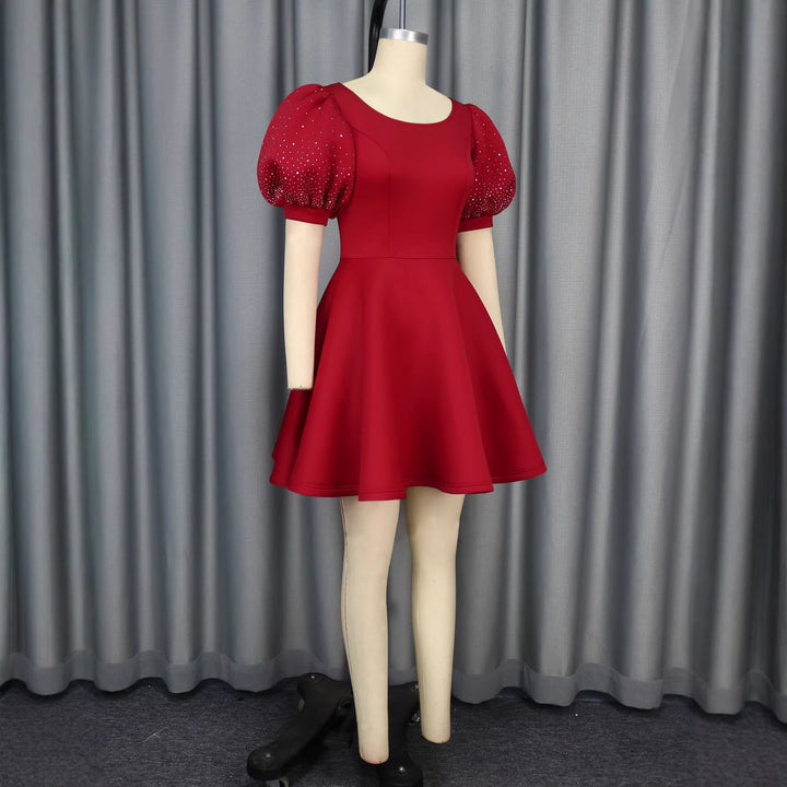 Damen A-Linien Kleid mit glamourösen Puffärmeln und Perlenapplikationen Drune