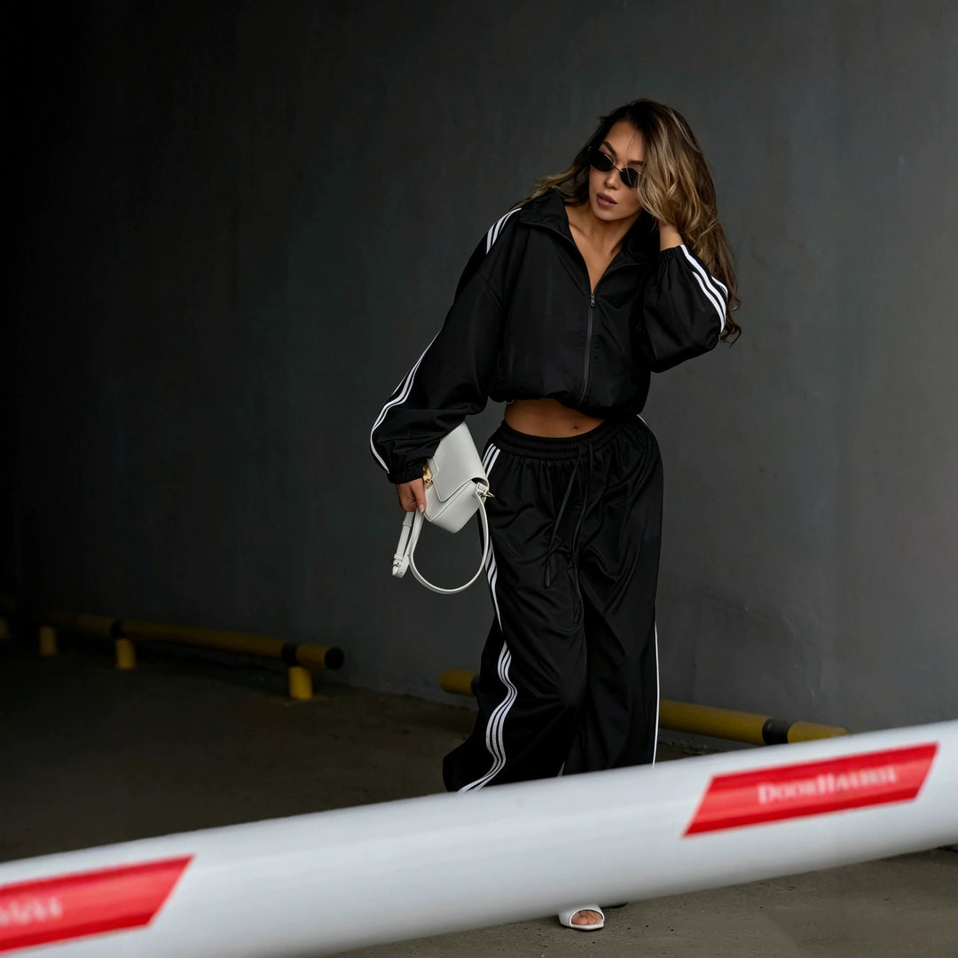 Damen Oversized kurz geschnittene Trainingsjacke und taillenhohe Jogginghose Set mit Seitenstreifen Drune