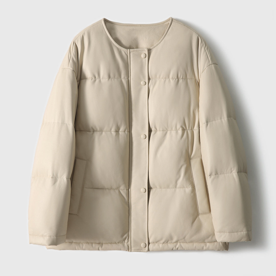 Damen Kurz geschnittene wattierte Kunstlederjacke mit Rundhalsaum und Druckknopfleiste Drune