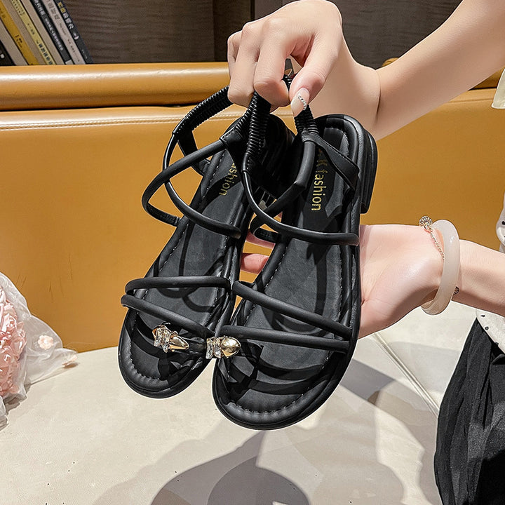Damen Flache Riemchensandalen mit Zehensteg, elastischem Fersenriemen und Schmuckapplikation Drune