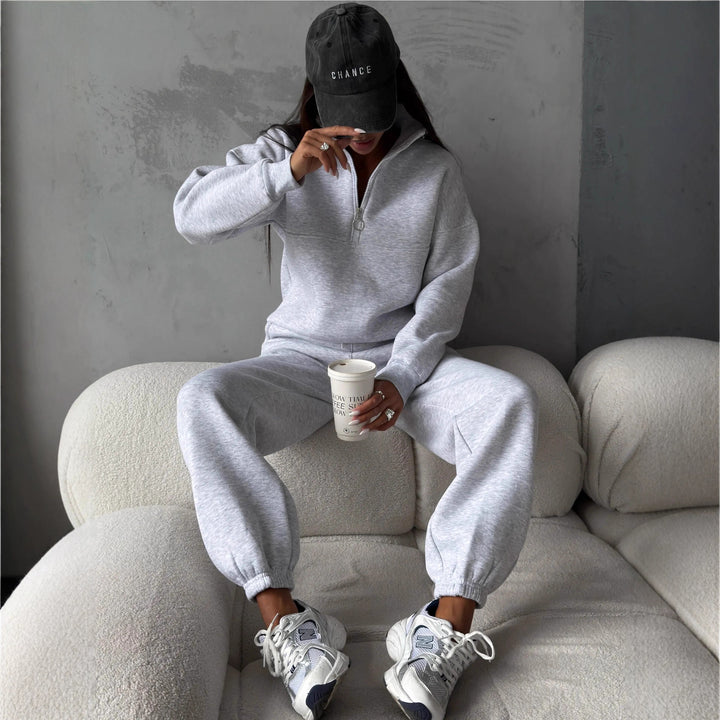 Damen sportlicher Fleece-Jogginganzug mit hohem Kragen und praktischen Reißverschlussdetails Drune