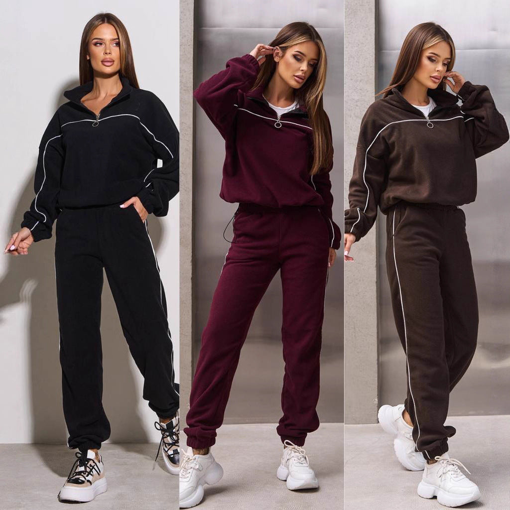 Damen Fleece-Sportanzug mit hohem Kragen und praktischen Reißverschlussdetails Drune