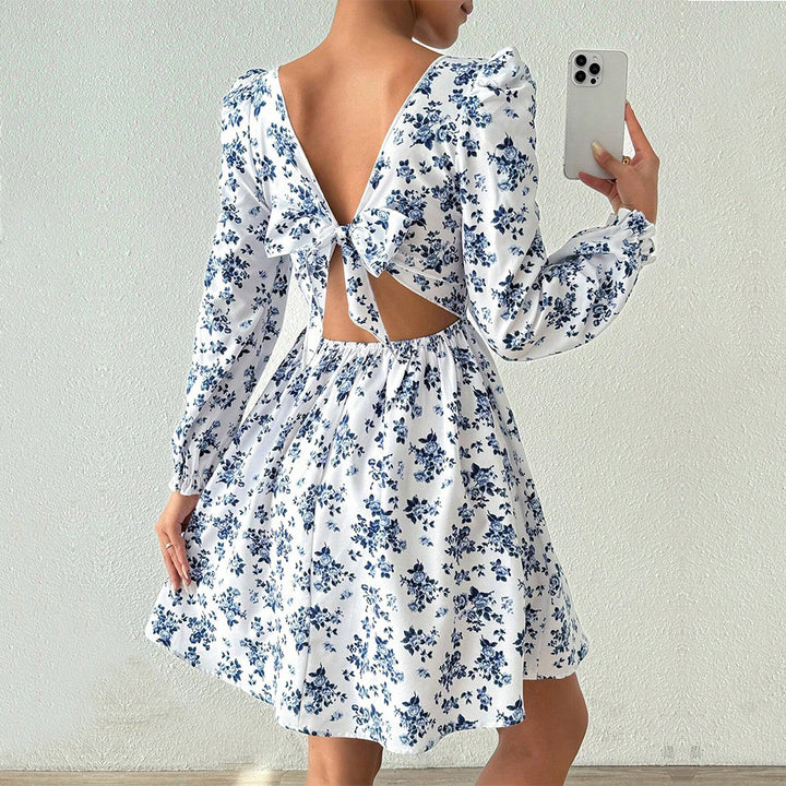 Damen florales Minikleid mit quadratischem Ausschnitt tailliertem Schößchen und langen Puffärmeln Drune
