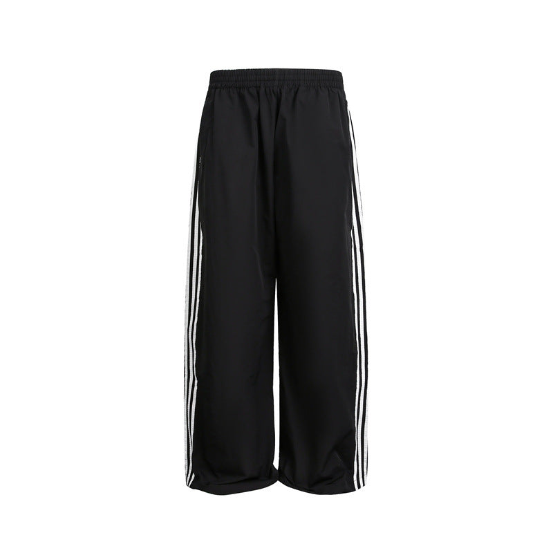 Damen weite Satin-Trainingshose mit elastischem Bund und seitlichen Kontraststreifen Drune