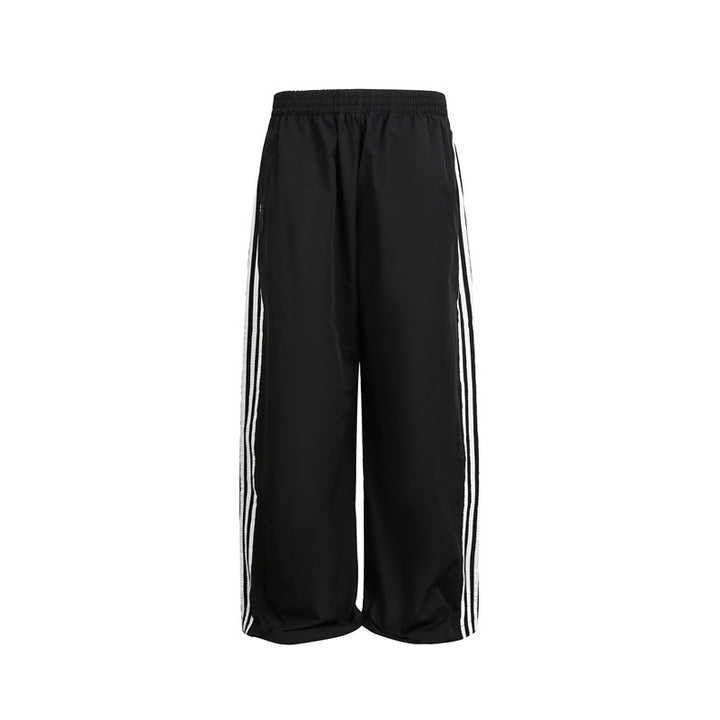 Damen weite Satin-Trainingshose mit elastischem Bund und seitlichen Kontraststreifen Drune