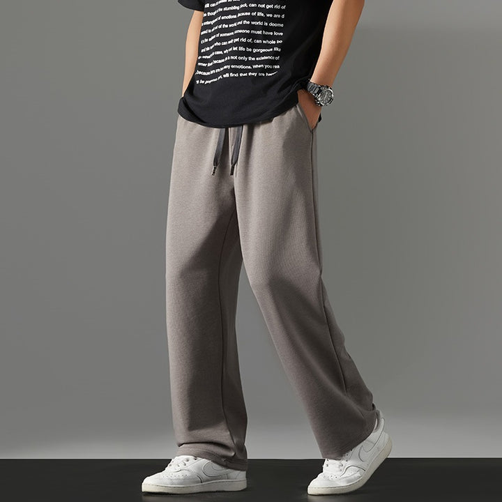 Herren weite Relaxed-Jogginghose aus French-Terry mit Kordelzug, elastischem Bund & geradem Bein Drune