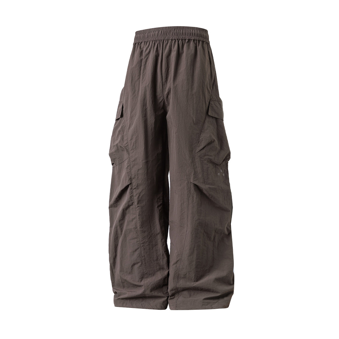 Unisex Weite Cargo‑Palazzo‑Hose aus technischer Crinkle‑Nylon mit elastischem Bund Drune