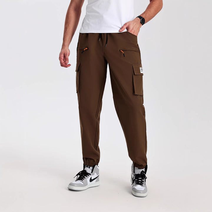 Herren Utility-Cargohose im Joggerstil mit elastischem Bund, Multifachtaschen & Reißverschlusstaschen Drune