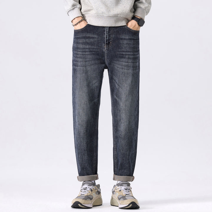 Herren konisch geschnittene Denimhose mit mittlerer Leibhöhe, relaxed Fit und dezenter Used-Optik Drune