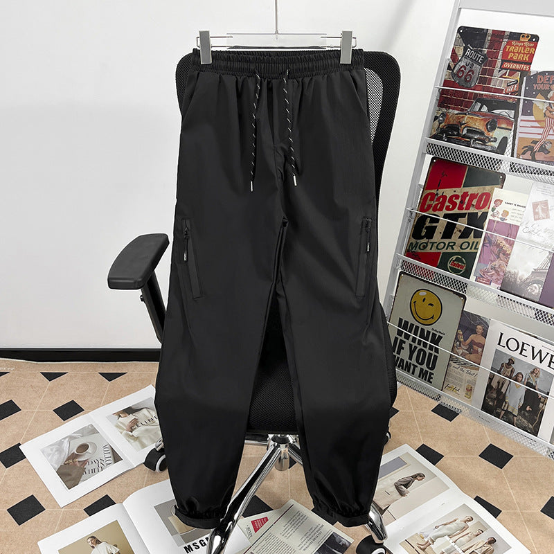 Unisex Sportliche Jogginghose mit verstellbarem Bund und Seitentaschen Drune