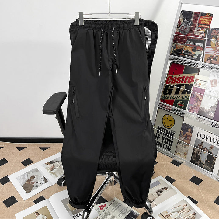 Unisex Sportliche Jogginghose mit verstellbarem Bund und Seitentaschen Drune