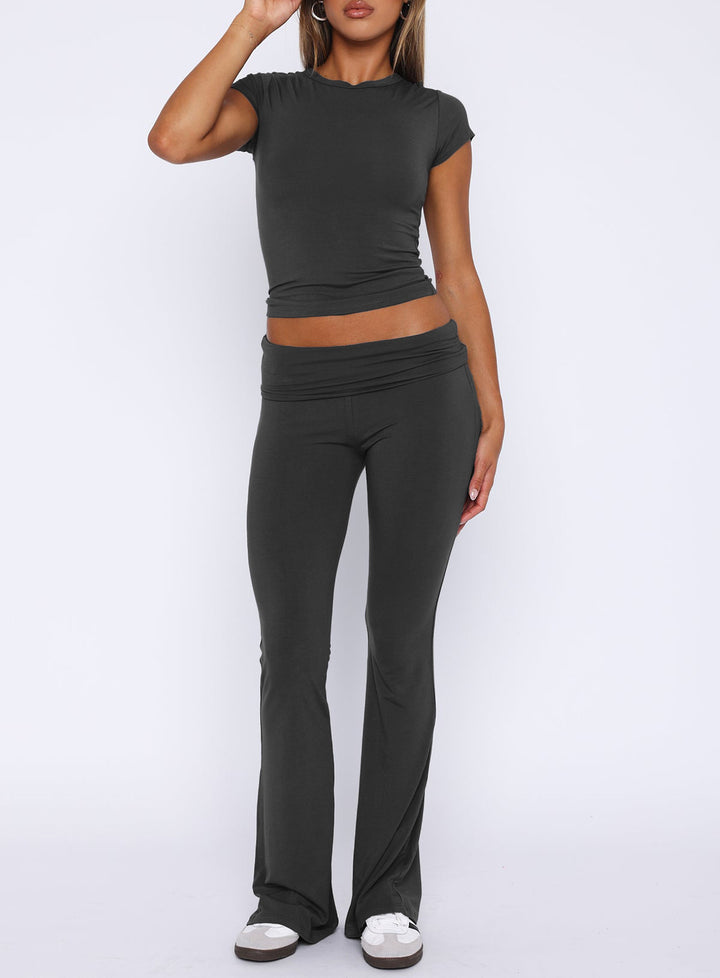 Damen sportliches Set mit figurbetontem Oberteil und ausgestellten Hosen Drune