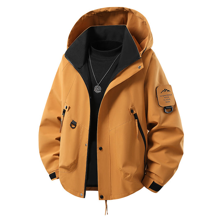 Herren wind- und wasserdichte Softshell-Outdoorjacke mit verstaubarer Kapuze, Utility-Taschen und verstellbaren Bündchen Drune