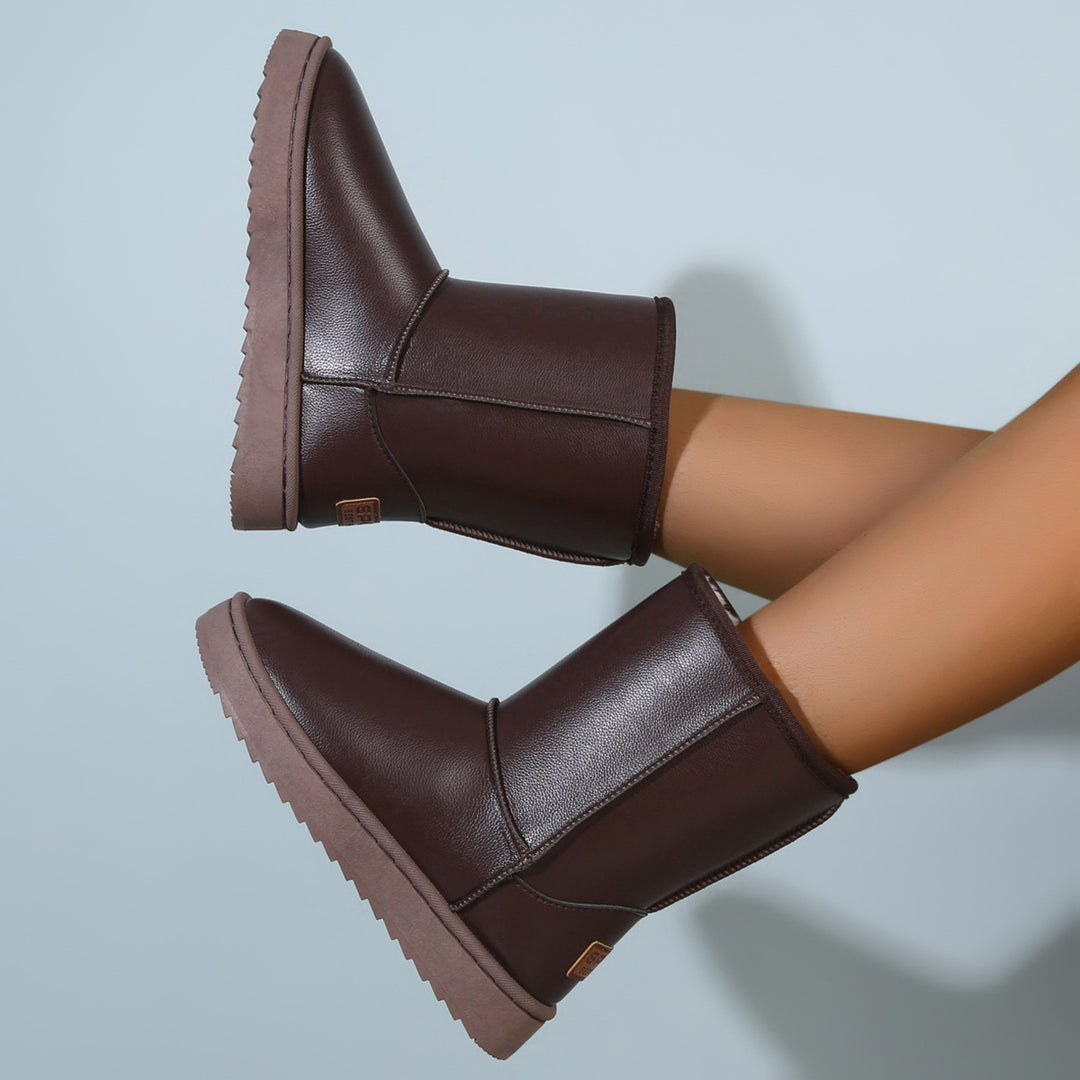 Damen Winterstiefel mit Teddyfutter, Lederoptik und flacher Plateau‑Sohle Drune